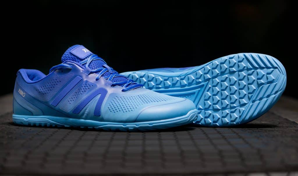 A blue gradient version of a barefoot running shoe, the HFS 2 from Xero Shoes.